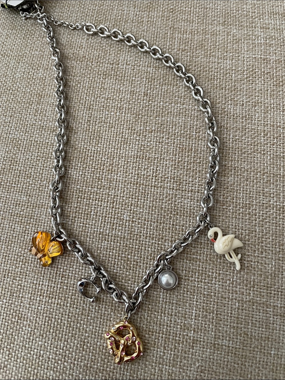 Coach Silver Tone Charm Necklace with Gold, Amber, Cream Accents